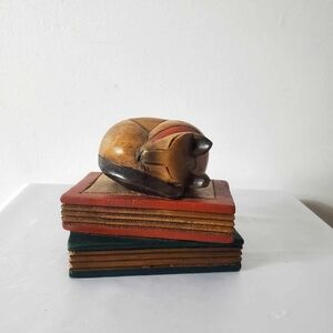 Cat sleeping on books, ornament or paperweight, Mandalay Box